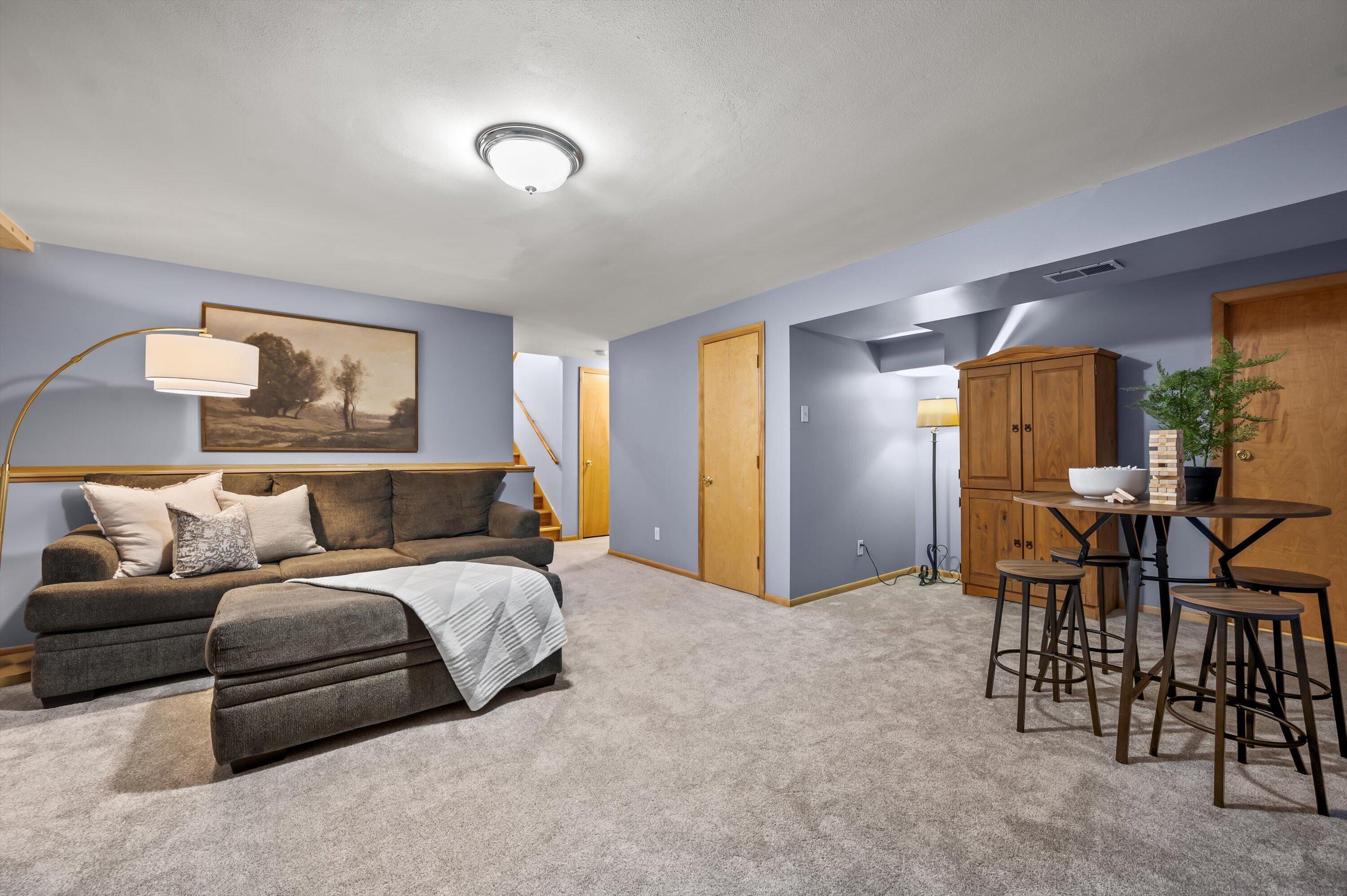 1130 Green Tree Road West Bend, WI 53090 - Photo 22 of 47 Lower Level Family Room