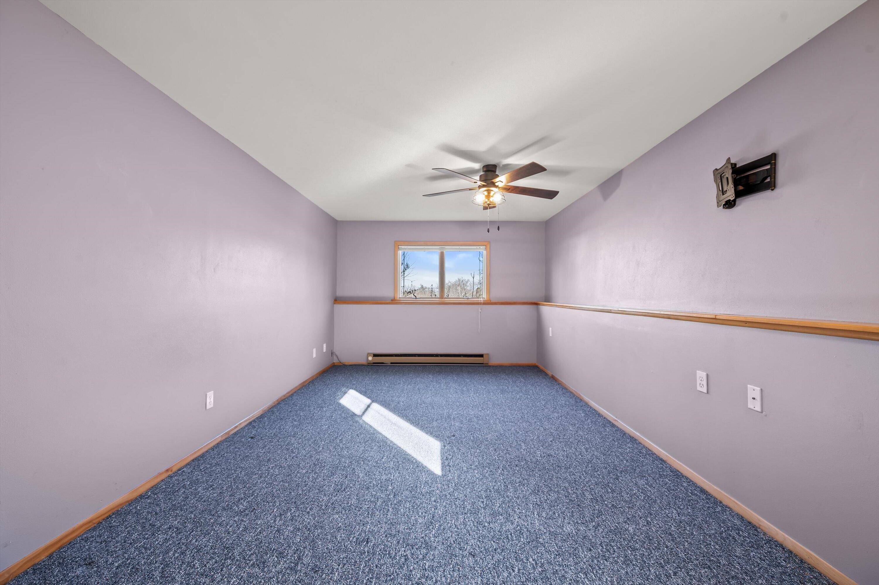 1130 Green Tree Road West Bend, WI 53090 - Photo 26 of 47 Lower Level Bedroom