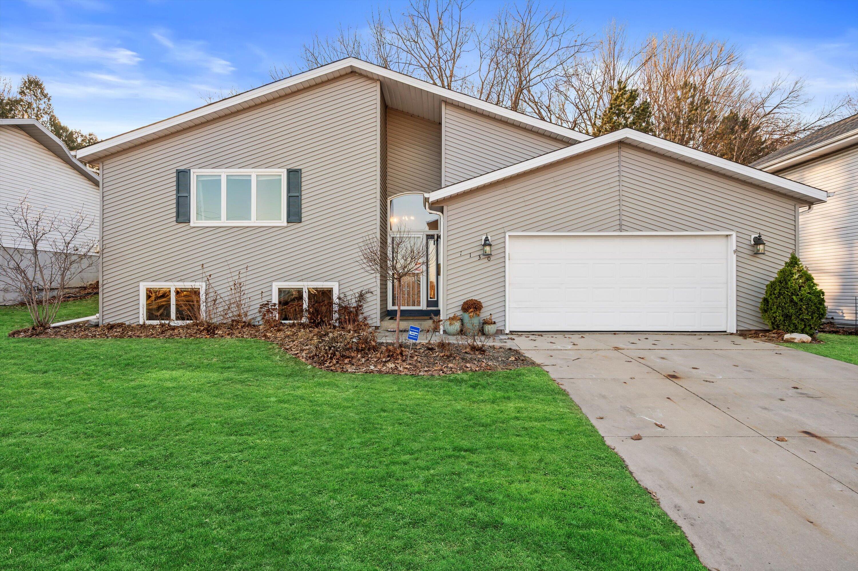 1130 Green Tree Road West Bend, WI 53090 - Photo 31 of 47 Virtual stage green in grass