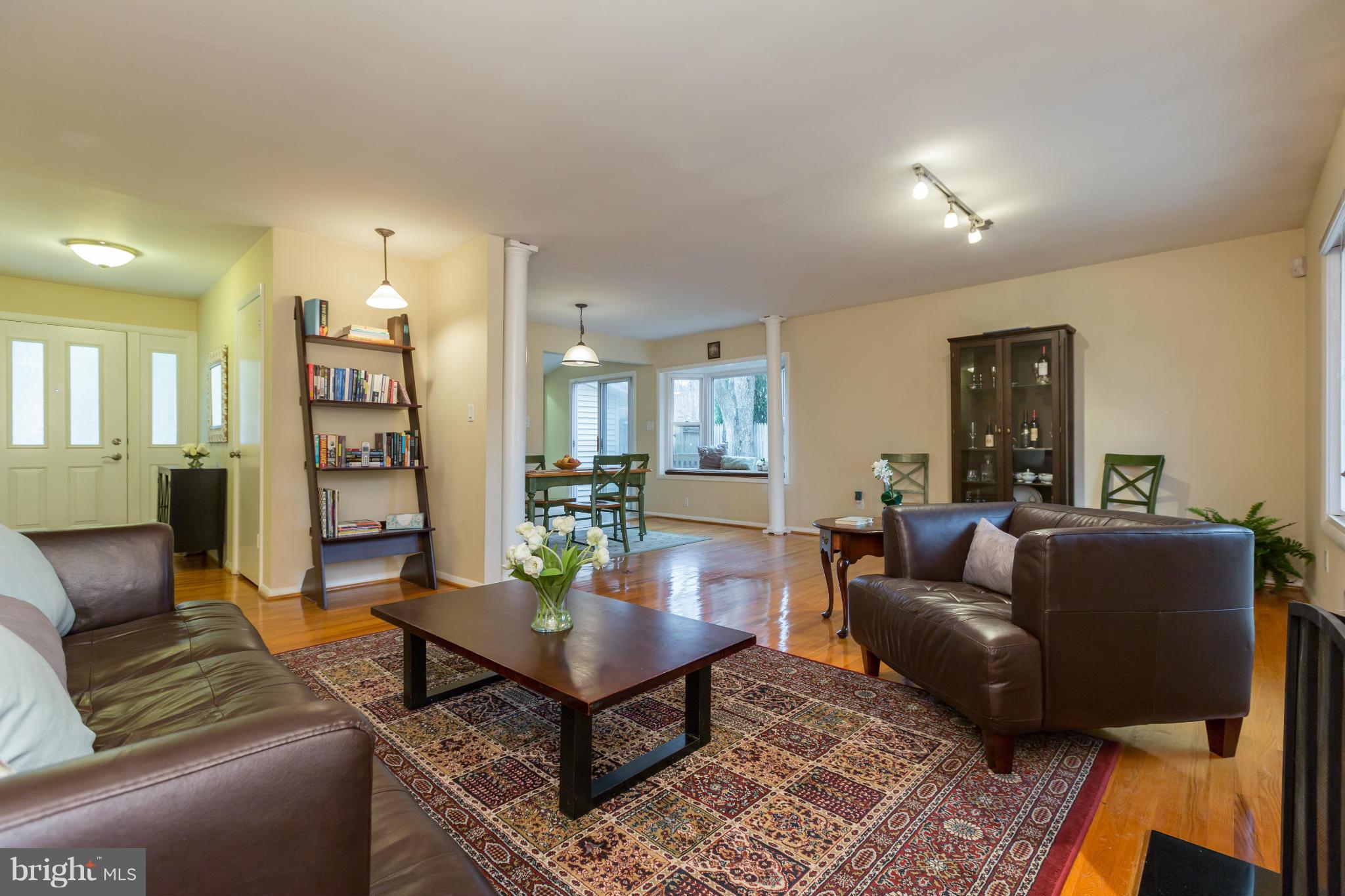 8003 Karl Road Alexandria, VA 22308 - Photo 4 of 30 a living room with furniture and wooden floor
