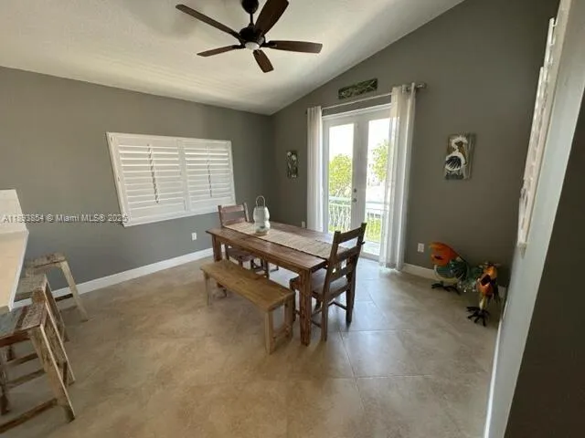 a workspace with furniture and a window