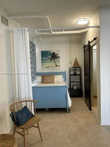 a room with furniture and a window