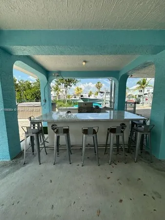 a view of a dining area with furniture window and outside view