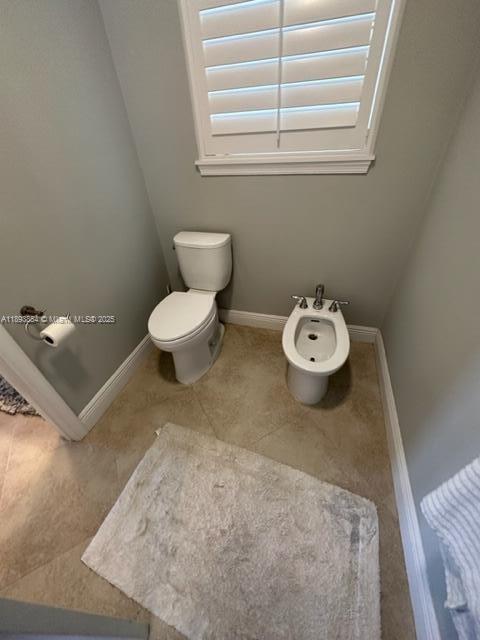 62 Waterways Drive Key Largo, FL 33037 - Photo 8 of 22 a bathroom with a toilet