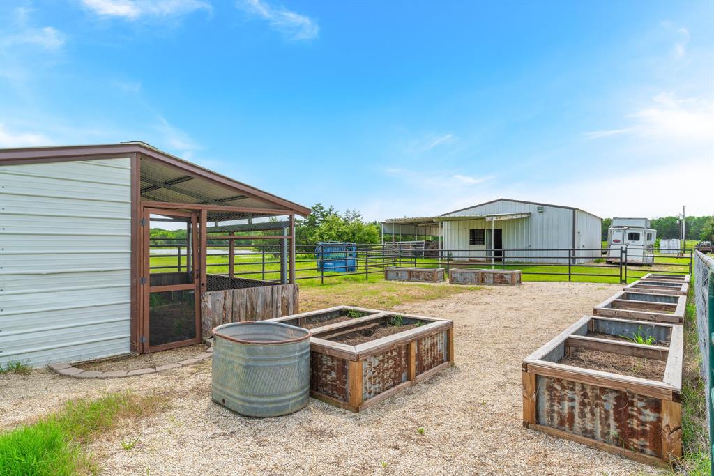 289 Blackjack Road Valley View, TX 76272 - Photo 38 of 40 Garden and Chicken Coop
