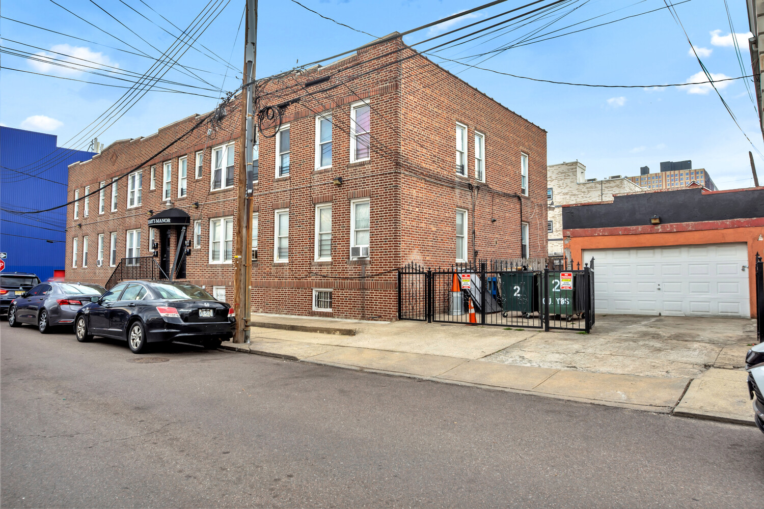 95-07 Cresskill Place Queens, NY 11435 - Photo 14 of 40 a view of a car is parked in front of a building