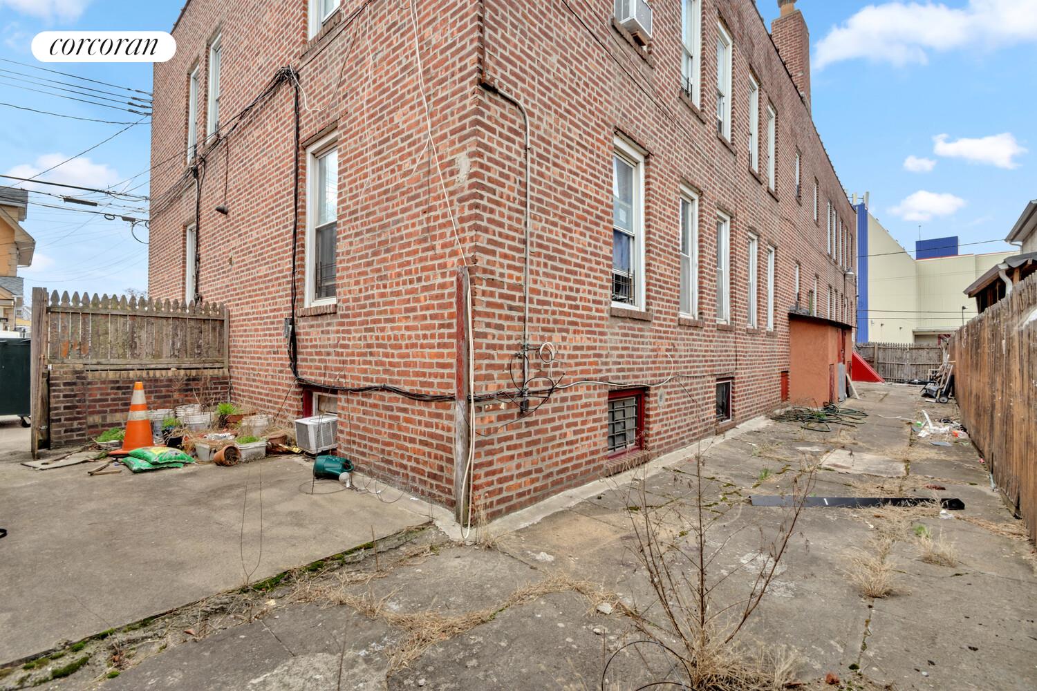 95-07 Cresskill Place Queens, NY 11435 - Photo 2 of 40 a view of a street with buildings