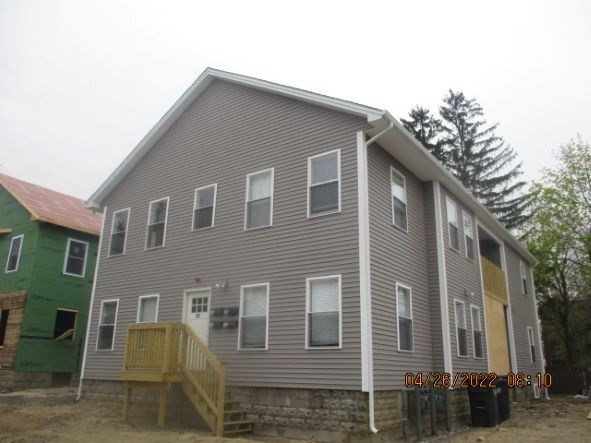 97 Alderman Street Springfield, MA 01108 - Photo 1 of 10 a front view of a house with a yard