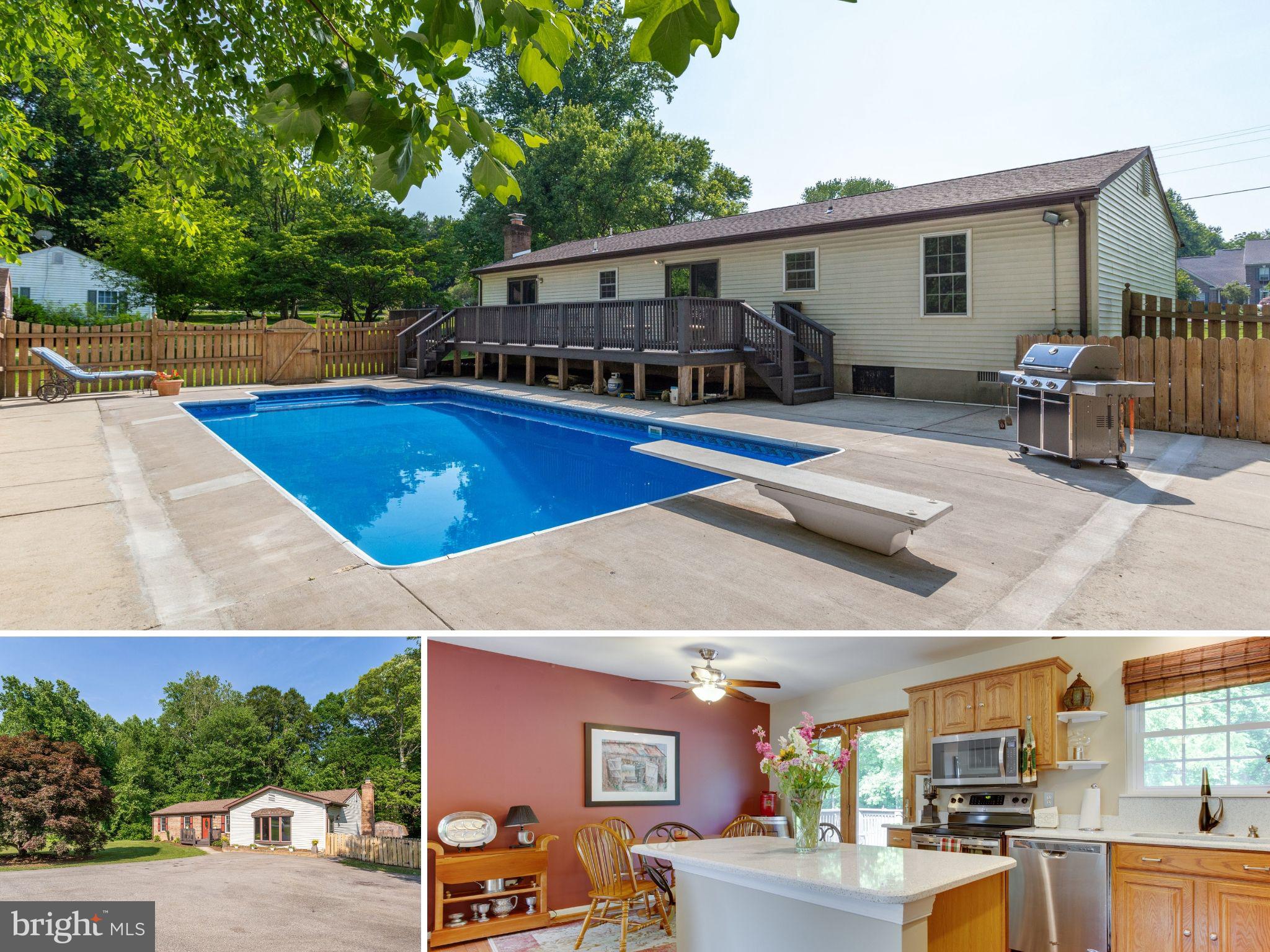 3100 Holland Cliffs Road Huntingtown, MD 20639 - Photo 1 of 44 a view of a house with a swimming pool
