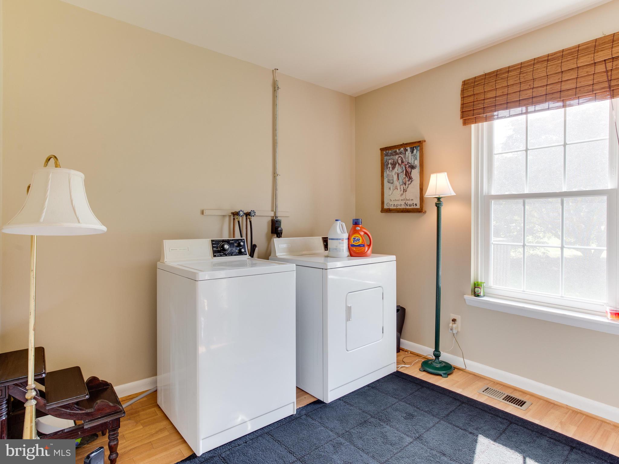 3100 Holland Cliffs Road Huntingtown, MD 20639 - Photo 30 of 44 a room with storage and utility