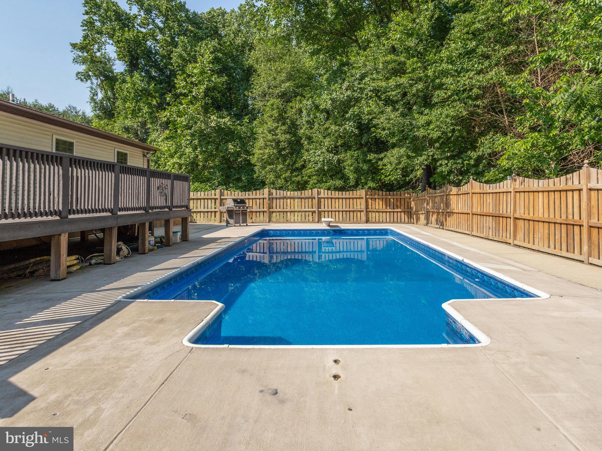 3100 Holland Cliffs Road Huntingtown, MD 20639 - Photo 32 of 44 a view of a swimming pool