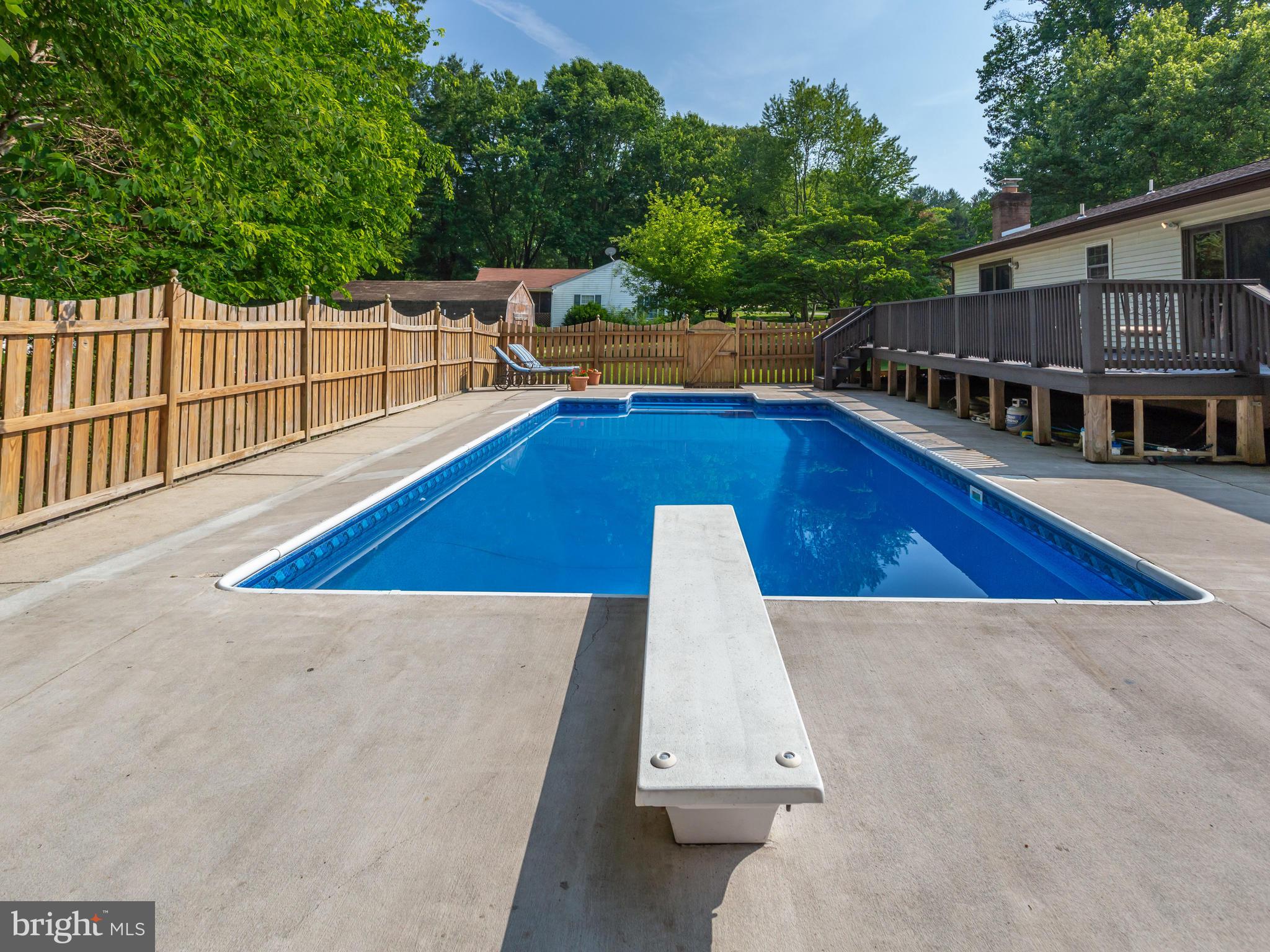 3100 Holland Cliffs Road Huntingtown, MD 20639 - Photo 34 of 44 swimming pool view with a outdoor space