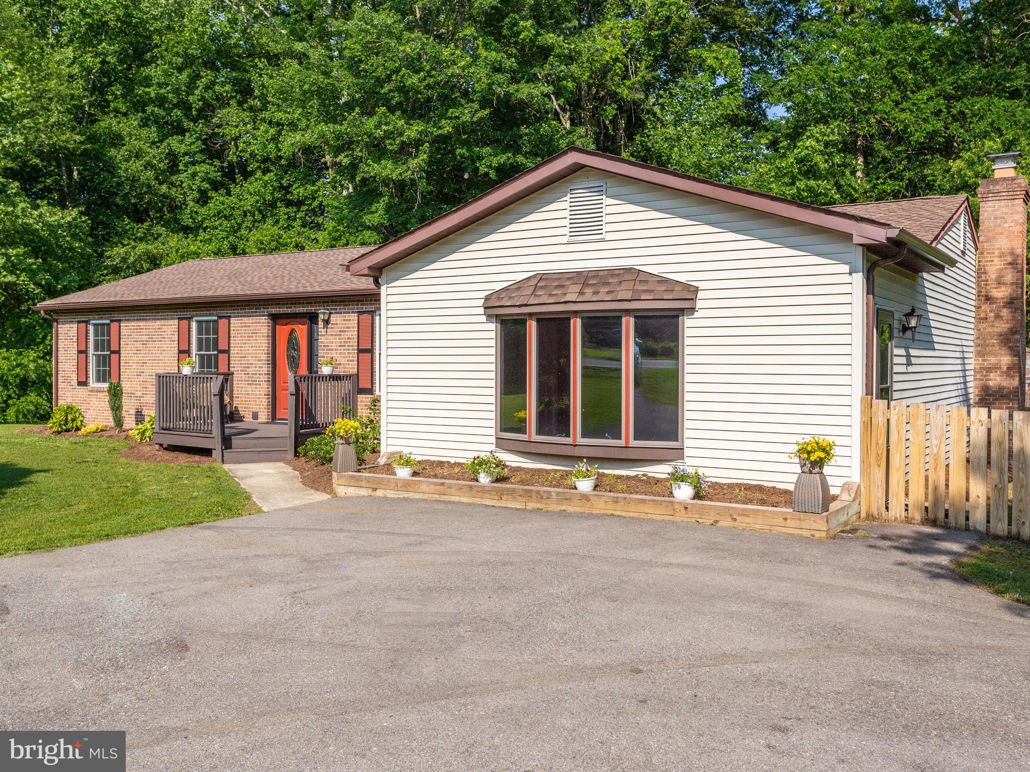 3100 Holland Cliffs Road Huntingtown, MD 20639 - Photo 41 of 44 a view of a house with backyard and garden