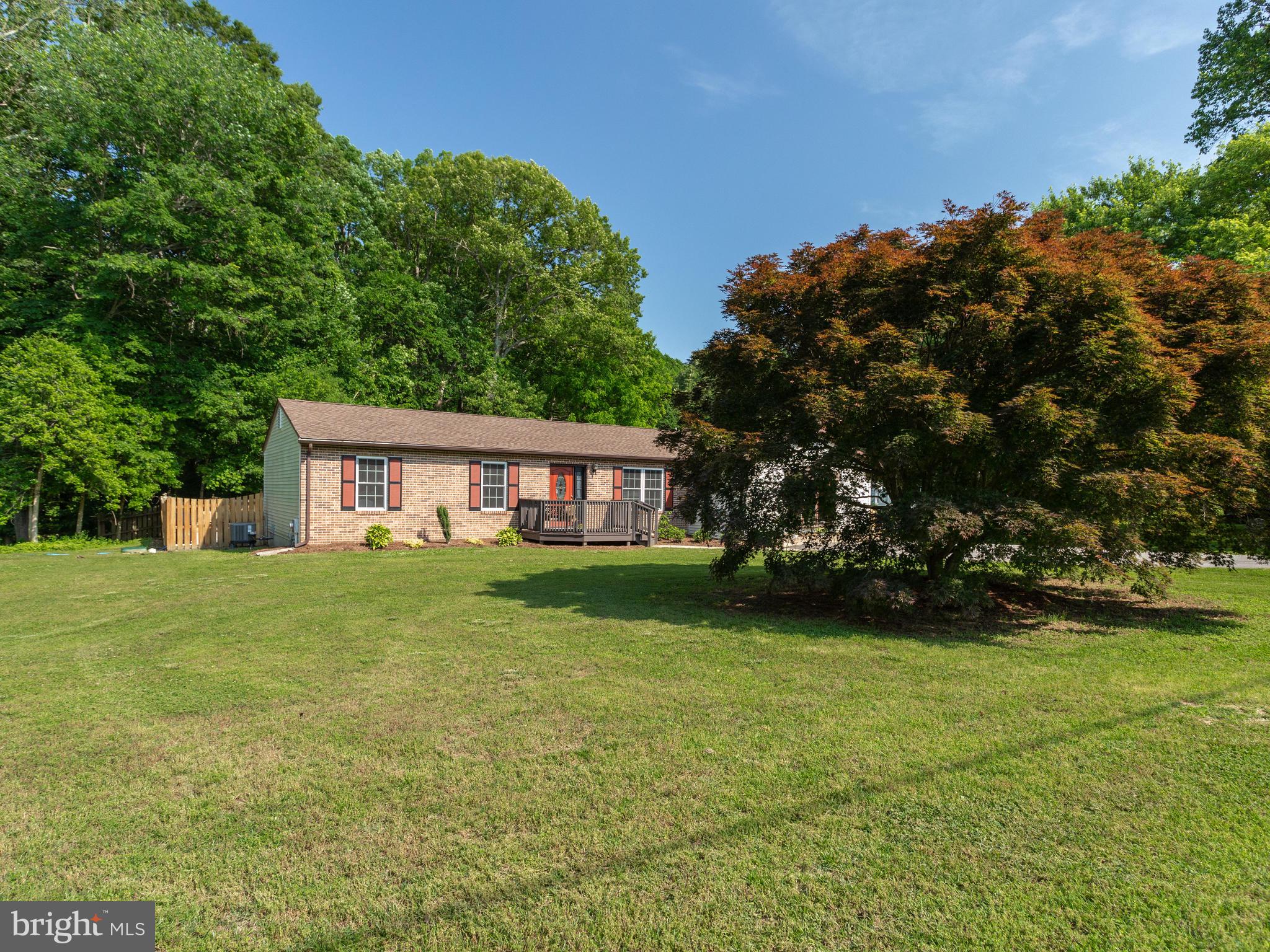 3100 Holland Cliffs Road Huntingtown, MD 20639 - Photo 43 of 44 a view of a house next to a big yard
