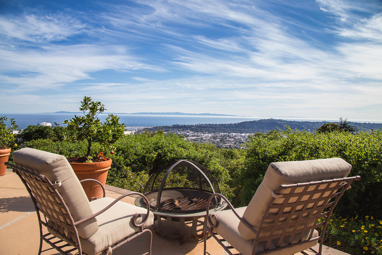 1213 Viscaino Road Santa Barbara, CA 93103 - Photo 1 of 22 a view of a chairs and table in the backyard