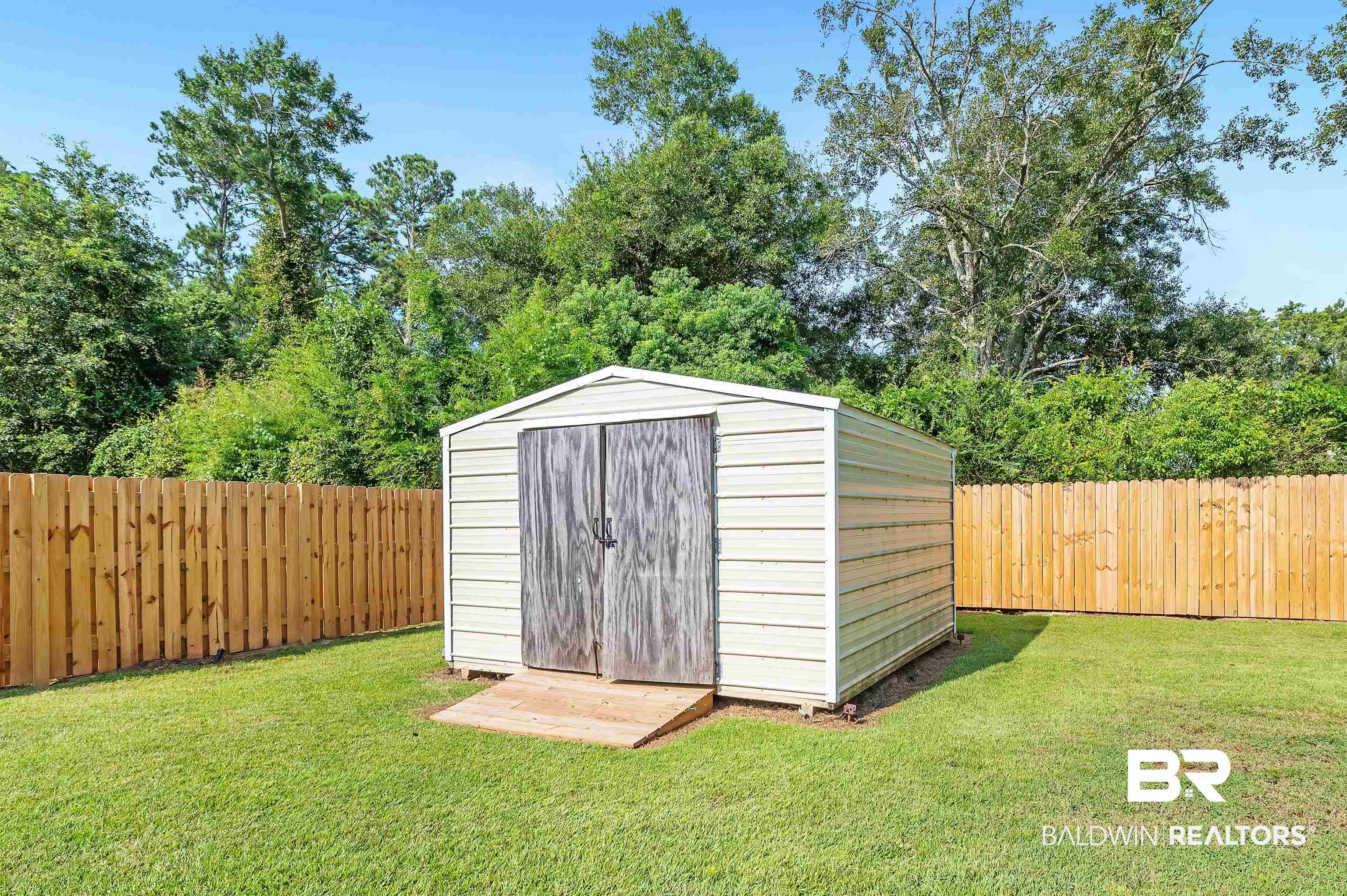 12443 Venice Boulevard Foley, AL 36535 - Photo 7 of 59 View of outdoor structure featuring a yard