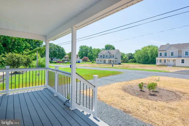a view of a street from a balcony