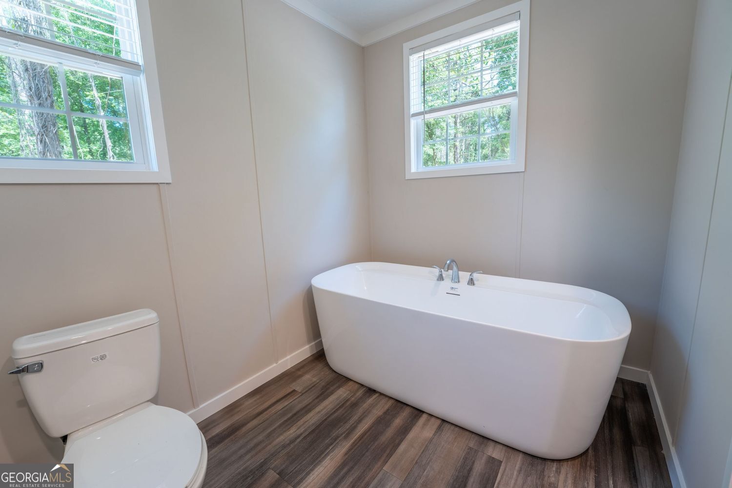 734 Hollywood Church Road Clarkesville, GA 30523 - Photo 34 of 49 a white bath tub sitting next to a toilet