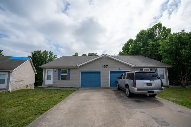 a house view with a garden space