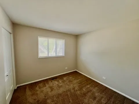 a view of a room that has a window in it