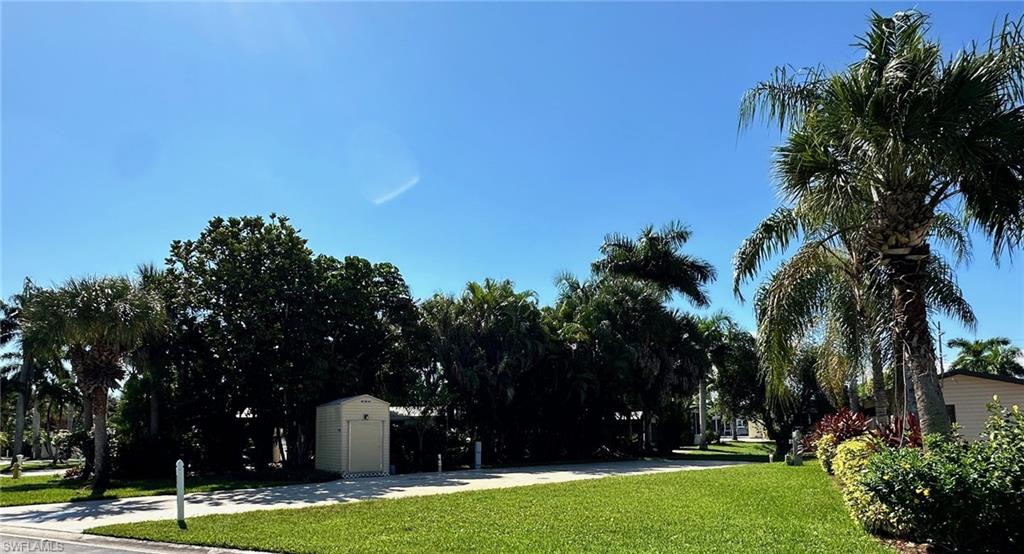 1313 Nickel Lake Point Naples, FL 34114 - Photo 3 of 10 View of grassy yard