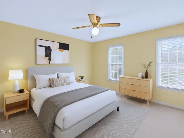 a view of a livingroom with furniture and wooden floor