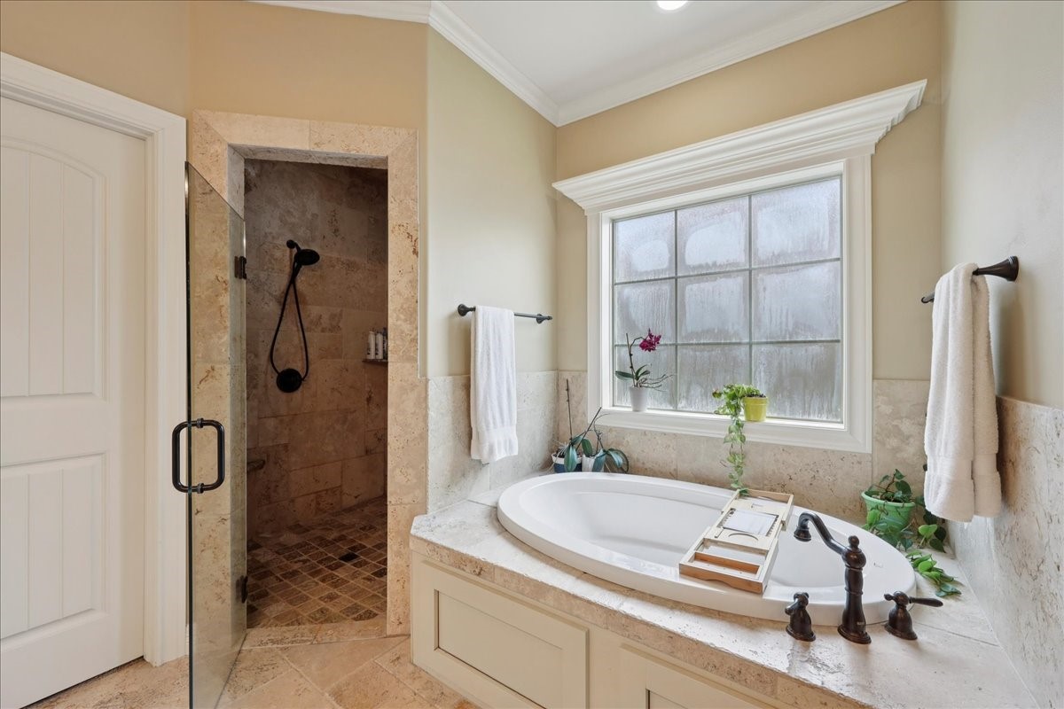 404 Birch View Drive Lumberton, TX 77657 - Photo 22 of 44 a bathroom with a granite countertop tub sink and mirror