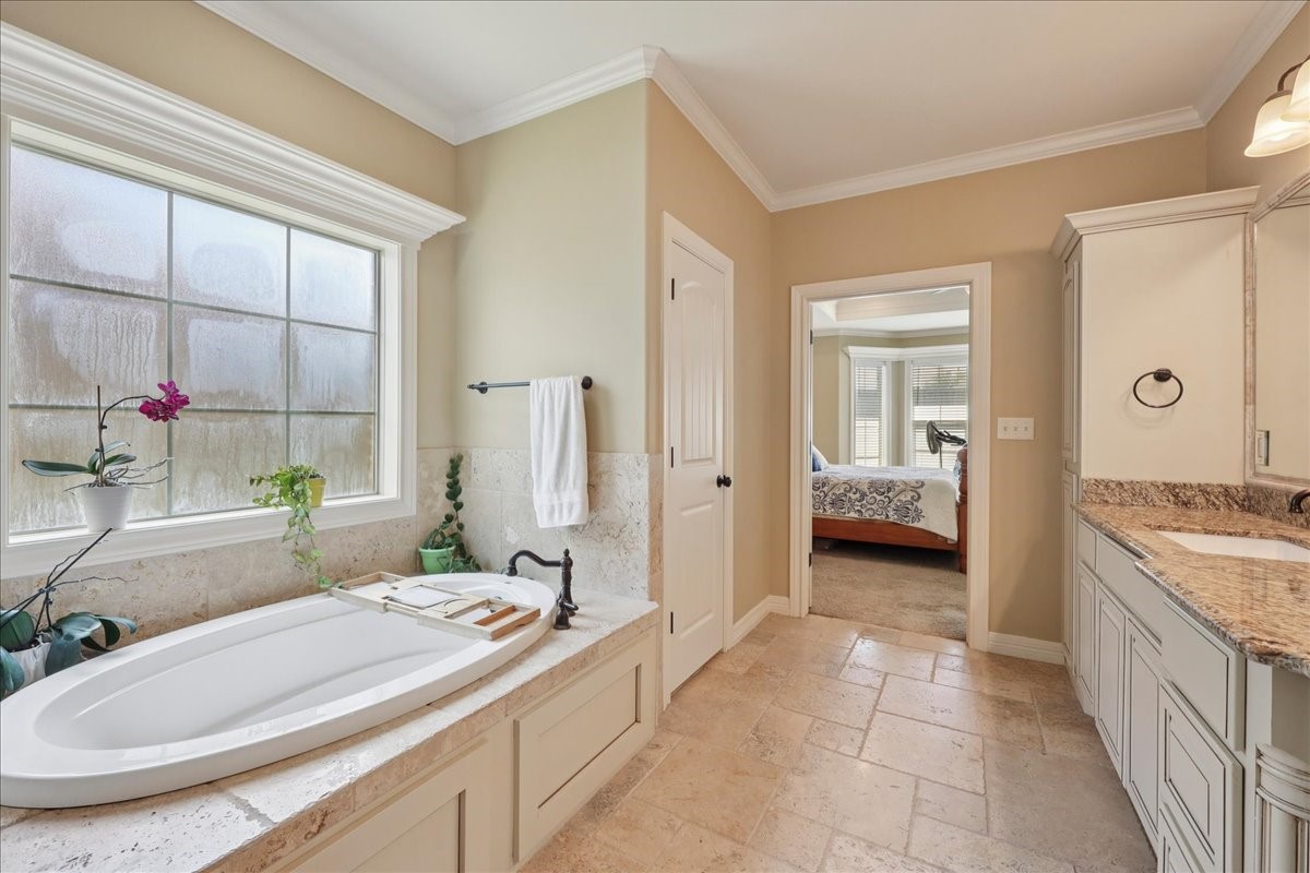 404 Birch View Drive Lumberton, TX 77657 - Photo 23 of 44 a bathroom with a granite countertop sink and a mirror