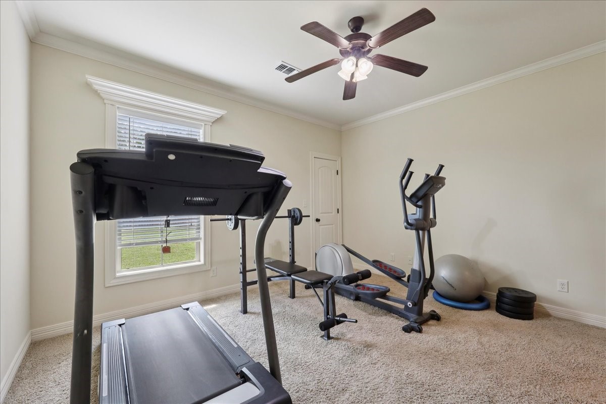 404 Birch View Drive Lumberton, TX 77657 - Photo 24 of 44 a view of a room with gym equipment