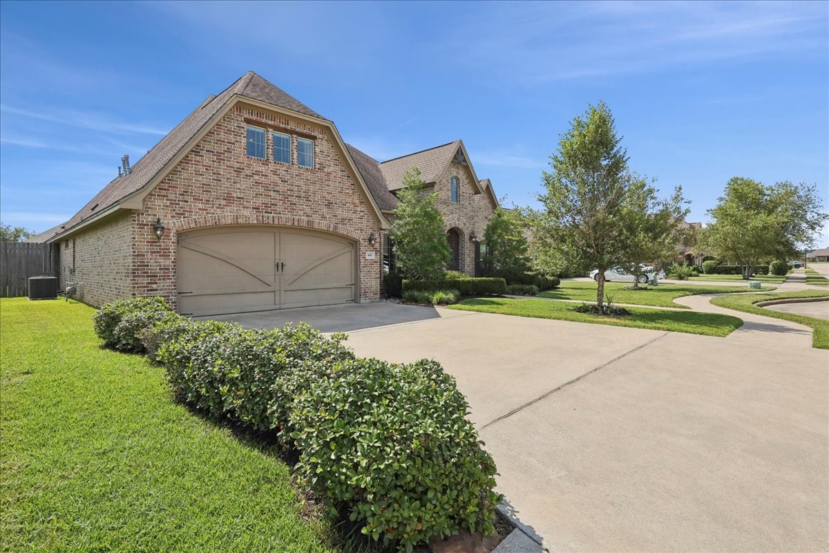 404 Birch View Drive Lumberton, TX 77657 - Photo 3 of 44 a front view of a house with a yard