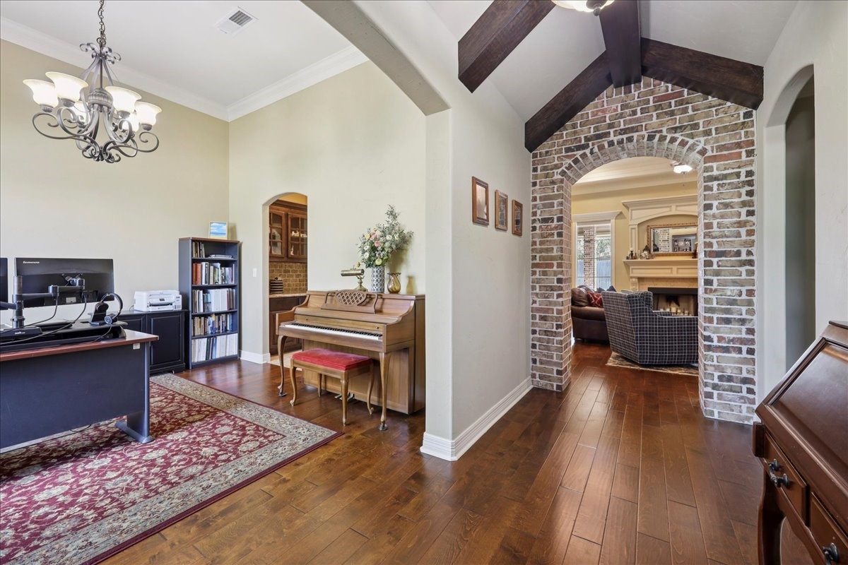 404 Birch View Drive Lumberton, TX 77657 - Photo 33 of 44 a living room with furniture and a wooden floor