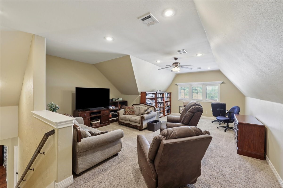 404 Birch View Drive Lumberton, TX 77657 - Photo 37 of 44 a living room with furniture and a flat screen tv