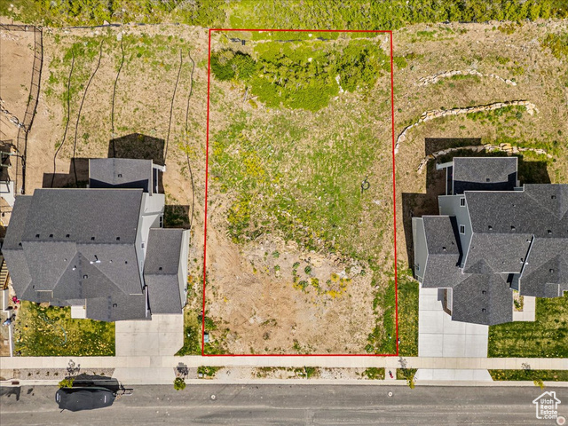 14673 South Ravine Rock Way East, Unit 720 Draper, UT 84020 - Photo 3 of 15 Aerial overview of property's location with property boundaries highlighted