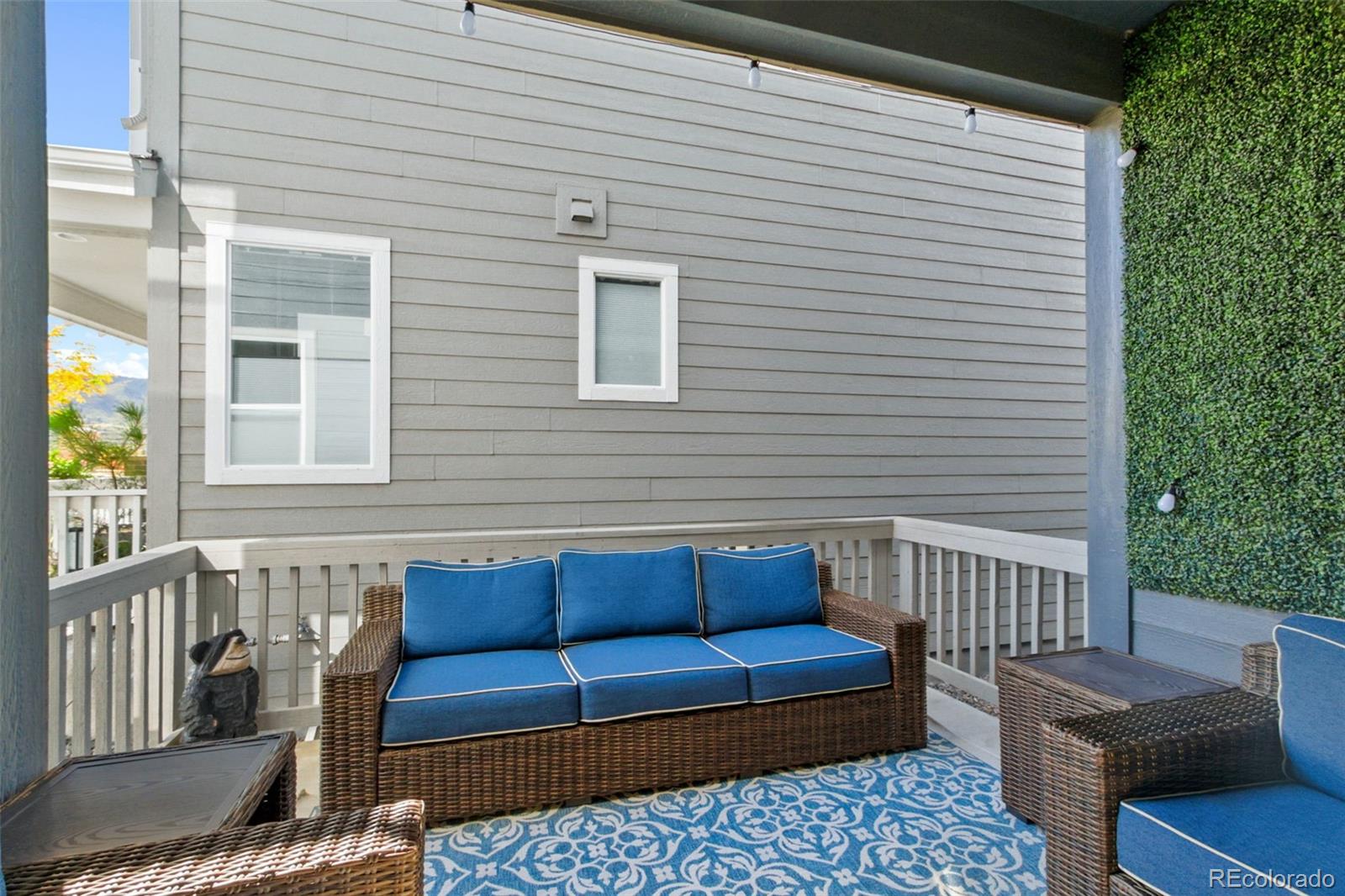 9753 Middle Peak Street Littleton, CO 80125 - Photo 14 of 41 a building outdoor space with patio furniture