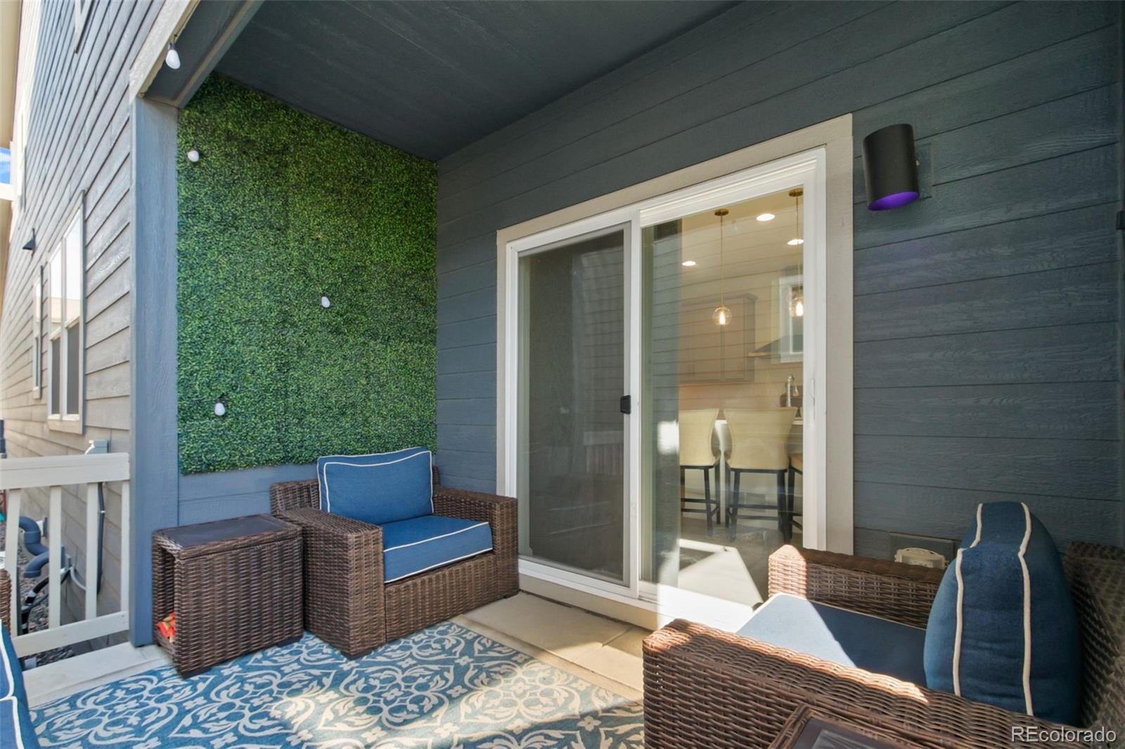 9753 Middle Peak Street Littleton, CO 80125 - Photo 15 of 41 a balcony view with a couch