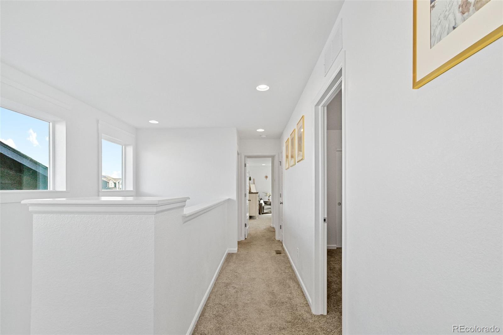 9753 Middle Peak Street Littleton, CO 80125 - Photo 20 of 41 a view of a hallway