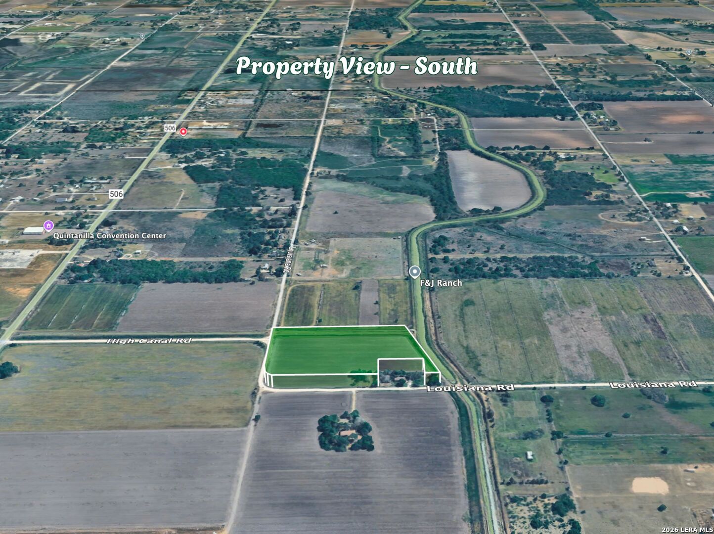 0 High Canal Santa Rosa, TX 78593 - Photo 11 of 23 an aerial view of a residential apartment building with a yard