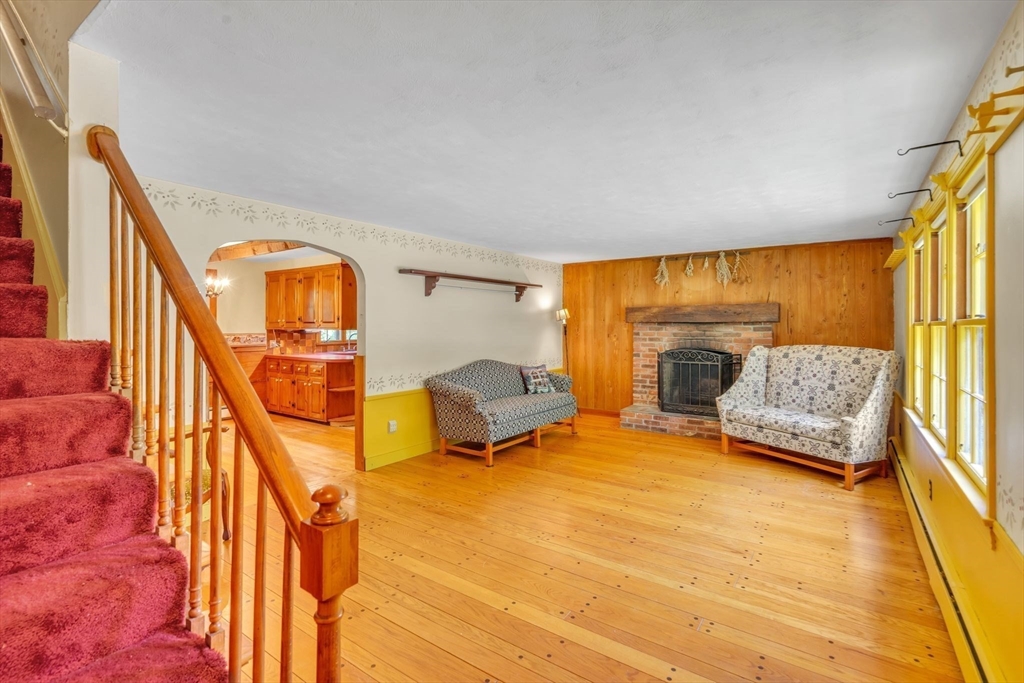 34 Crest Road Monson, MA 01057 - Photo 23 of 42 a bedroom with furniture and a fireplace