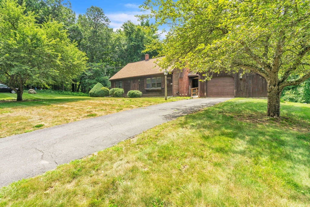 34 Crest Road Monson, MA 01057 - Photo 3 of 42 a house with swimming pool in front of it