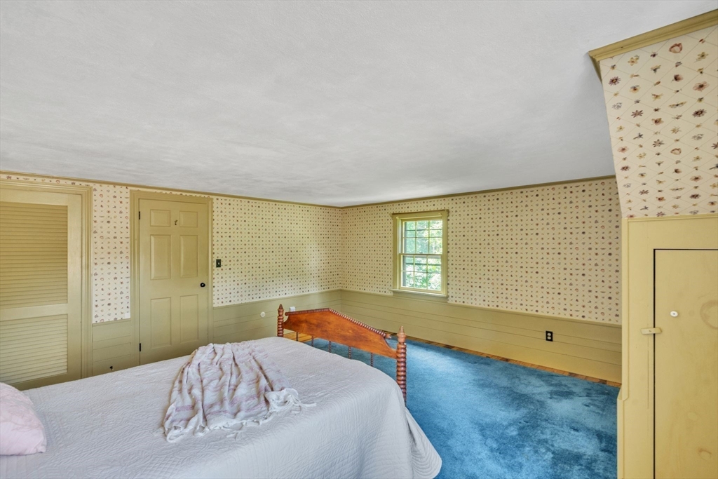 34 Crest Road Monson, MA 01057 - Photo 31 of 42 a bedroom with a bed and a window