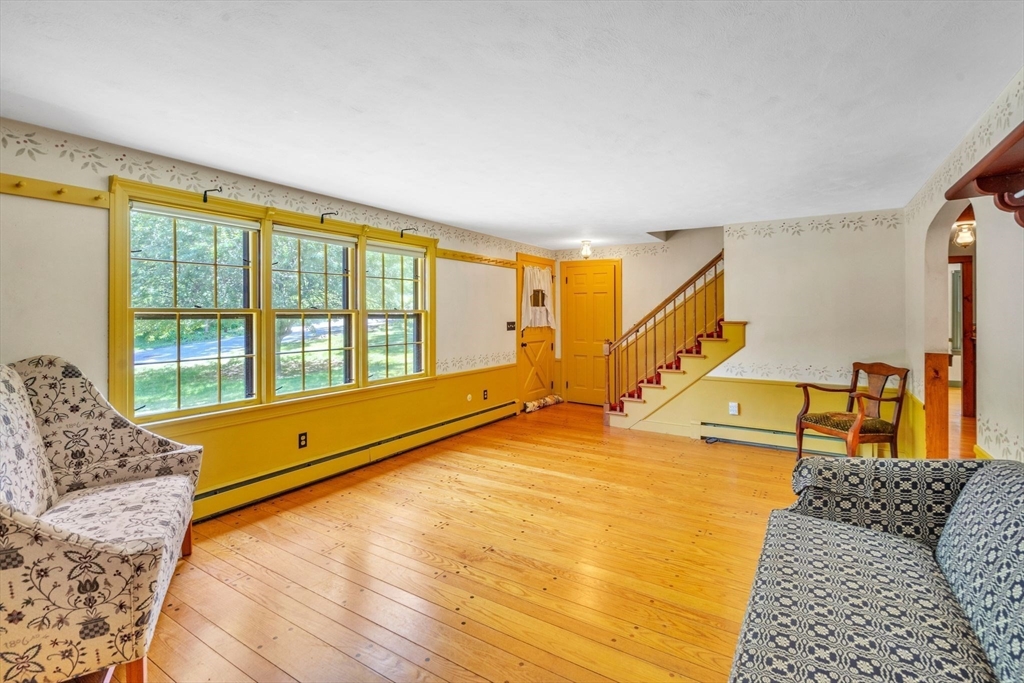 34 Crest Road Monson, MA 01057 - Photo 8 of 42 a bedroom with a bed and wooden floor