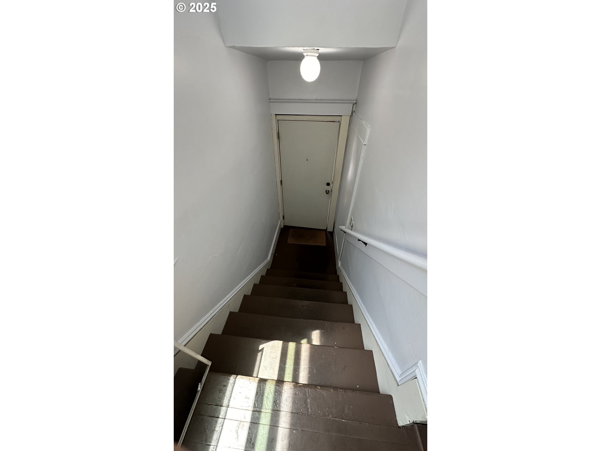 3122 North Williams Avenue Portland, OR 97227 - Photo 30 of 30 a view of a hallway with wooden floor