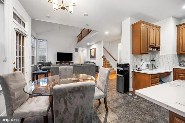 a view of a livingroom with furniture and wooden floor