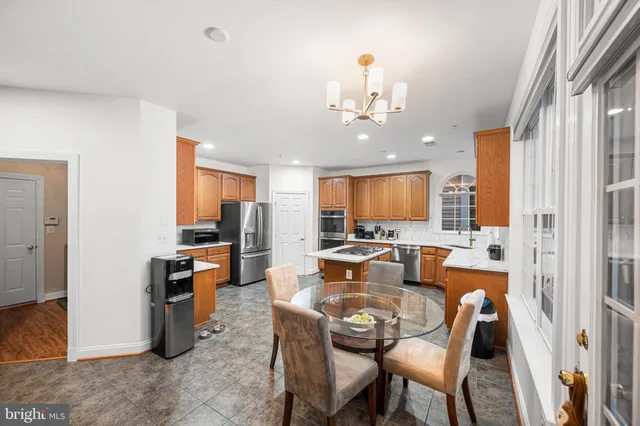 a view of room with furniture and flat screen tv