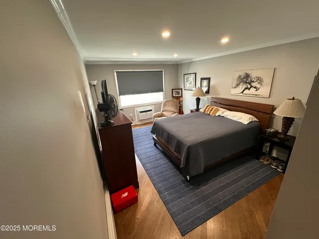 a bedroom with a bed and furniture
