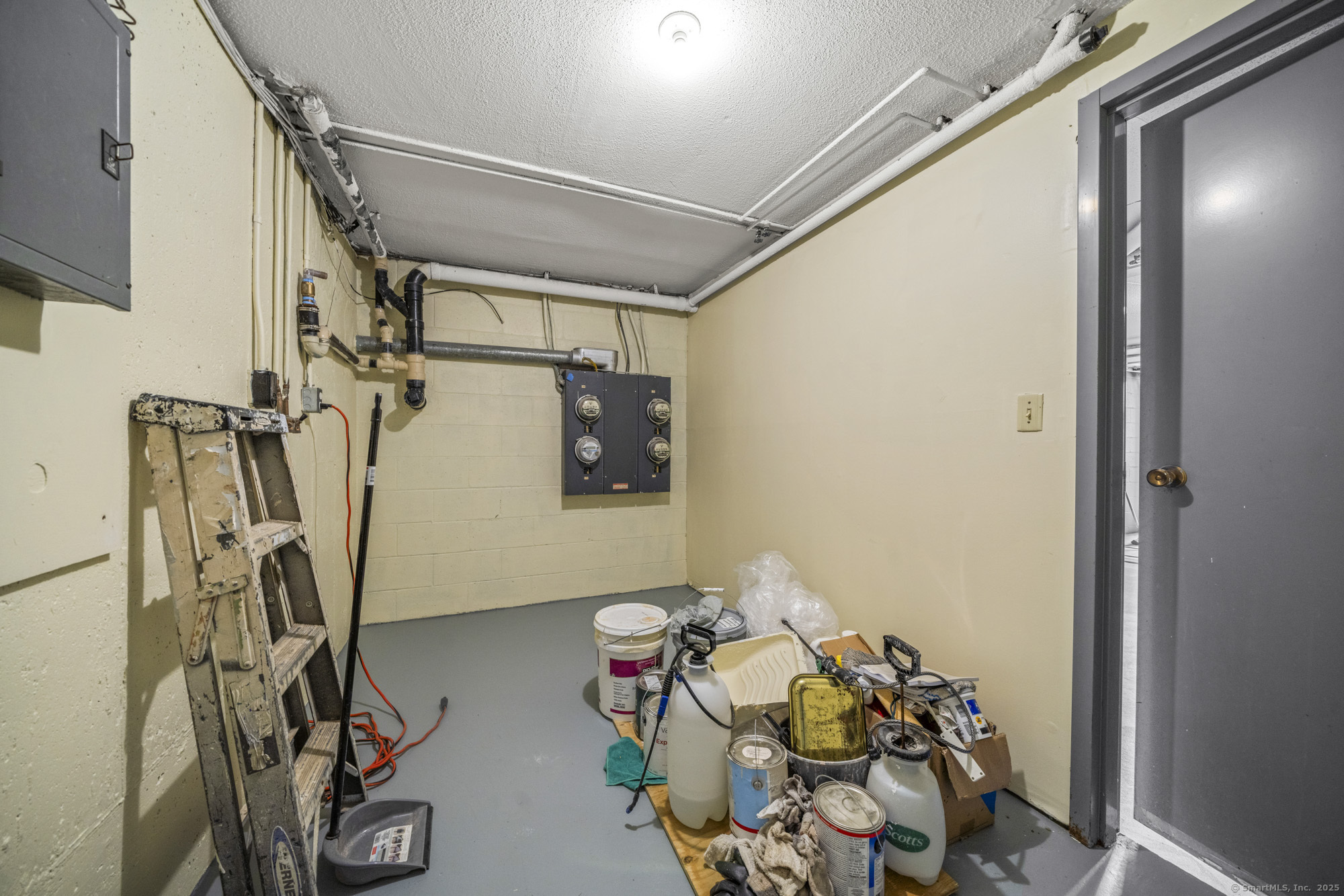 161 Kinney Street Torrington, CT 06790 - Photo 11 of 19 a view of walk in closet with clothes and shoes