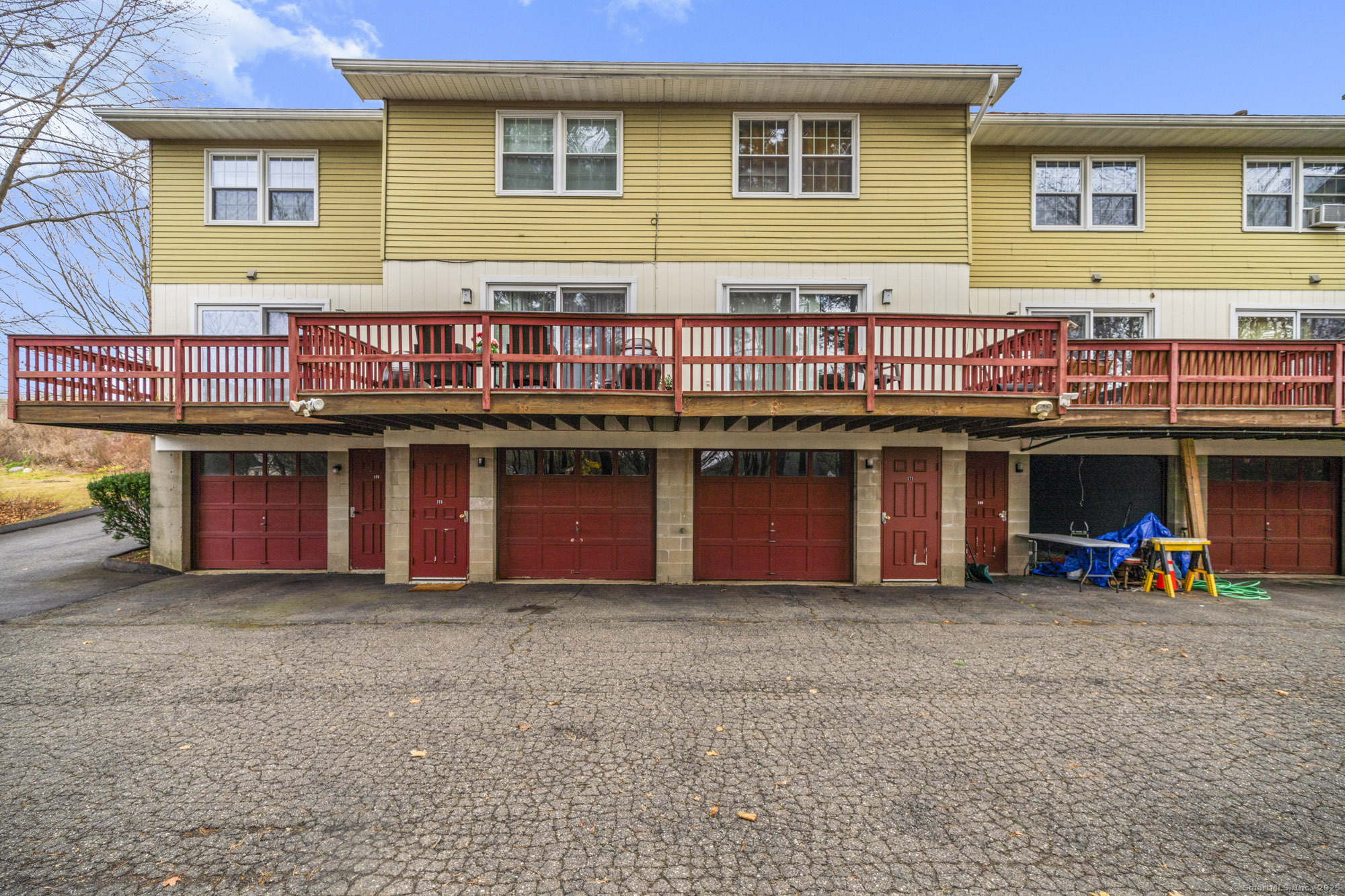 161 Kinney Street Torrington, CT 06790 - Photo 3 of 19 a view of a house with wooden deck and a barbeque