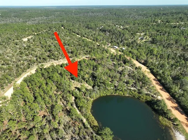 a view of a houses with a park