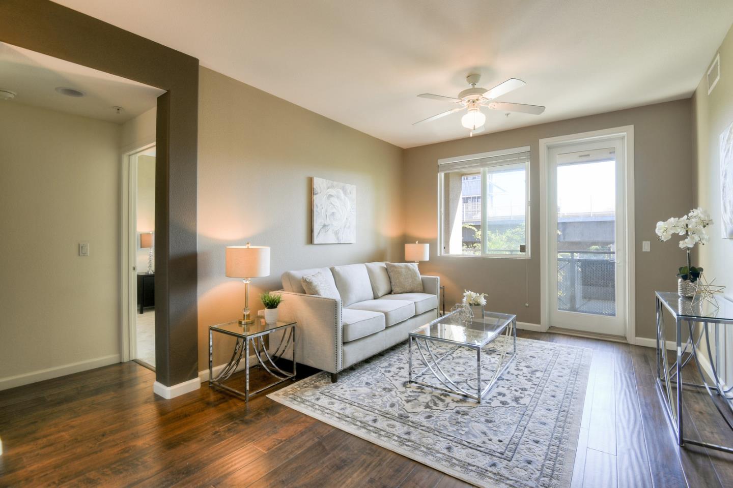 1101 South Main Street, Unit 316 Milpitas, CA 95035 - Photo 1 of 30 a living room with furniture and wooden floor