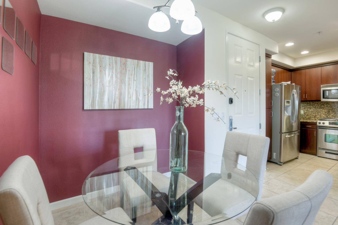 1101 South Main Street, Unit 316 Milpitas, CA 95035 - Photo 11 of 30 a living room with furniture chandelier and a view of kitchen